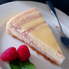 Himmlisch-cremiger New York Cheesecake mit fruchtigem Cranberry-Swirl